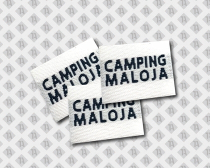 Gewebtes Label „Camping Maloja“ weiß-schwarz, rechteckig