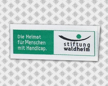 Bunte Loop Fold Labels mit 1A-Logo in Grün, Weiß und Dunkelblau