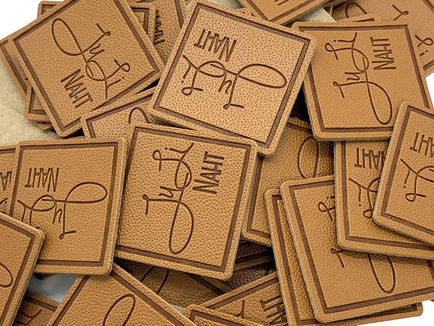 Label Etikette Leder Kunstleder Echtleder Veredelung Textil Branding Marken Werbeträger