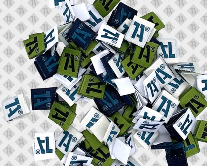 Loop Fold Labels mit 1A-Logo in Grün, Weiß und Dunkelblau